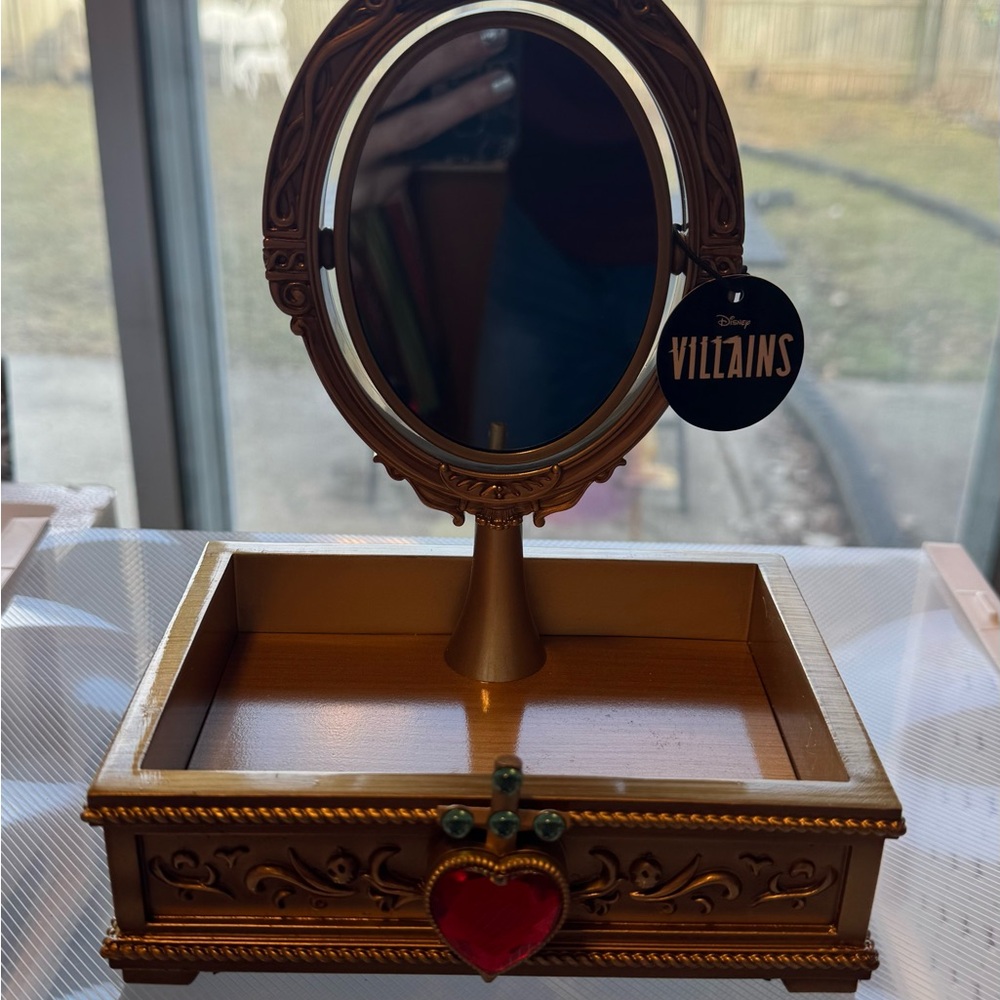 Disney Villains Gold jewelry holder with light up mirror.
